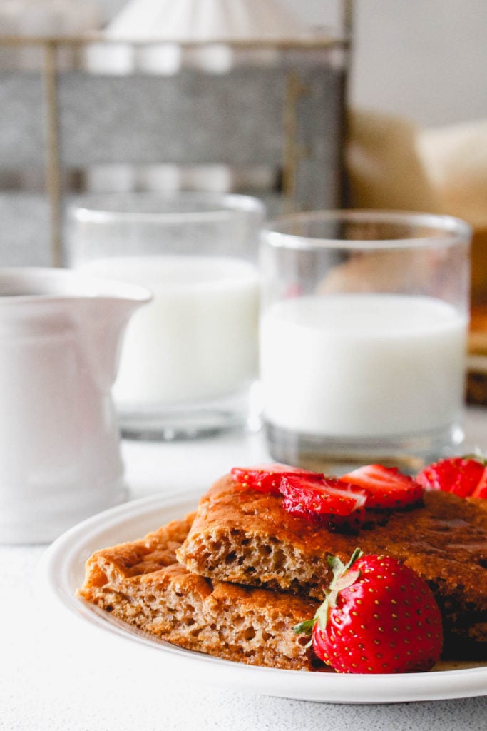 Sheet pan pancake served with maple syrup