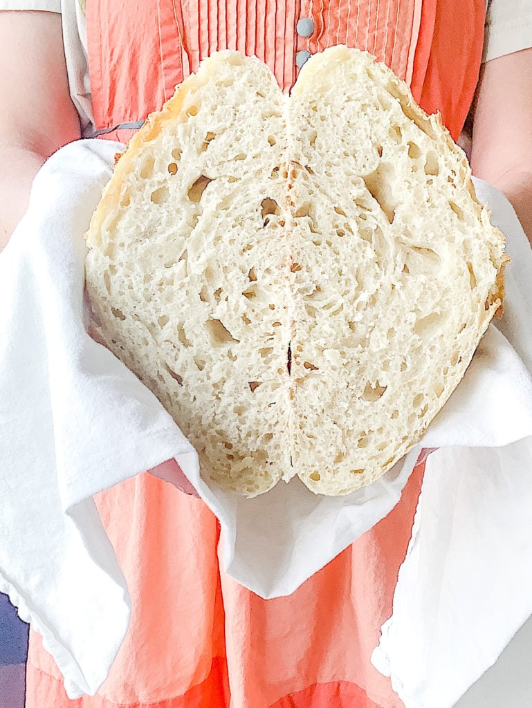 sourdough loaf cut in half to show the texture of the bread