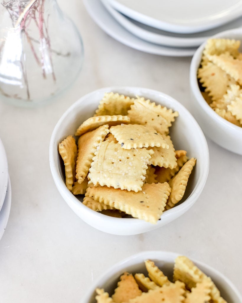 A snack-sized bowl of sourdough crackers ready to be eaten!