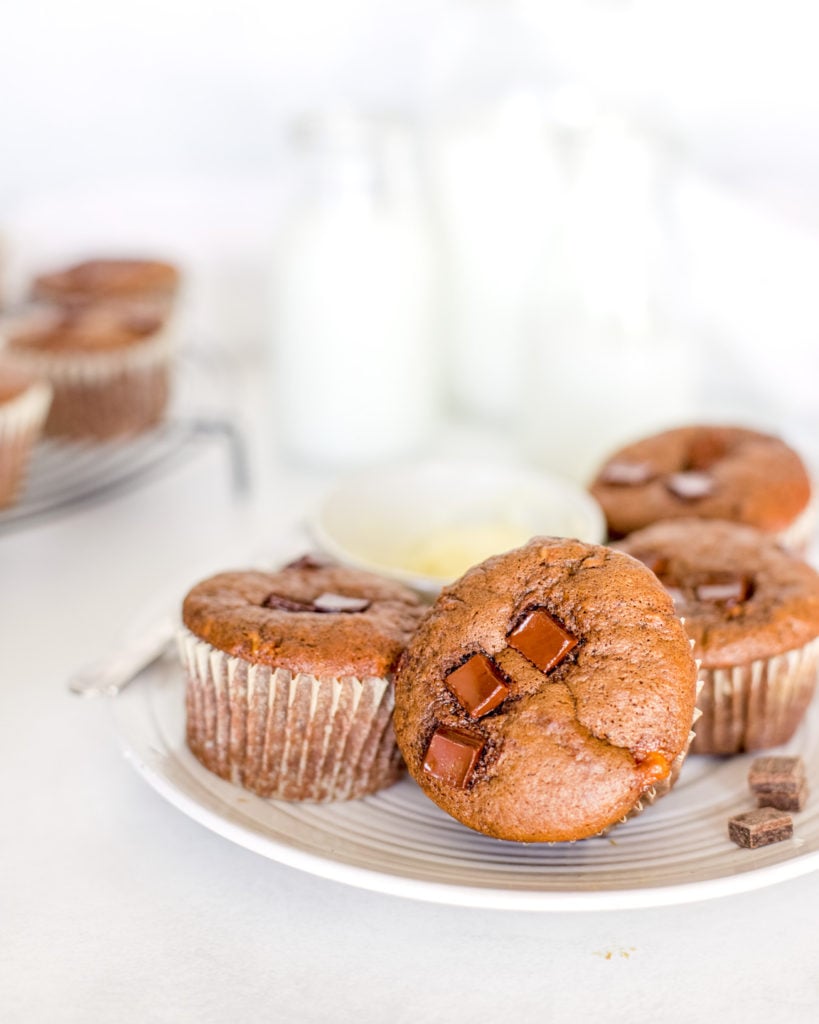 A plate full of the best chocolate banana muffins you will ever eat!