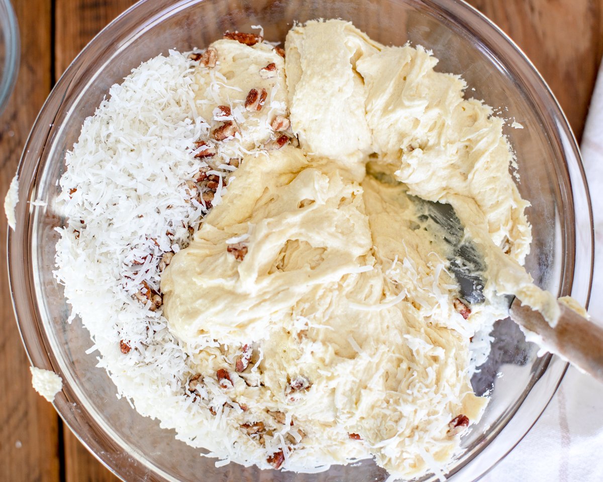folding in the dry ingredients with the pecans and coconut.