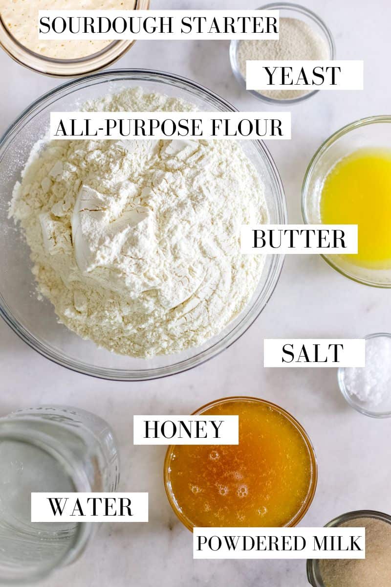 A flat lay of ingredients for making a loaf of sourdough pan de mie in a pullman pan for sandwich bread.