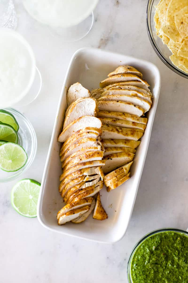 A top view of air fryer chicken breasts that were cooked and sliced to perfection.