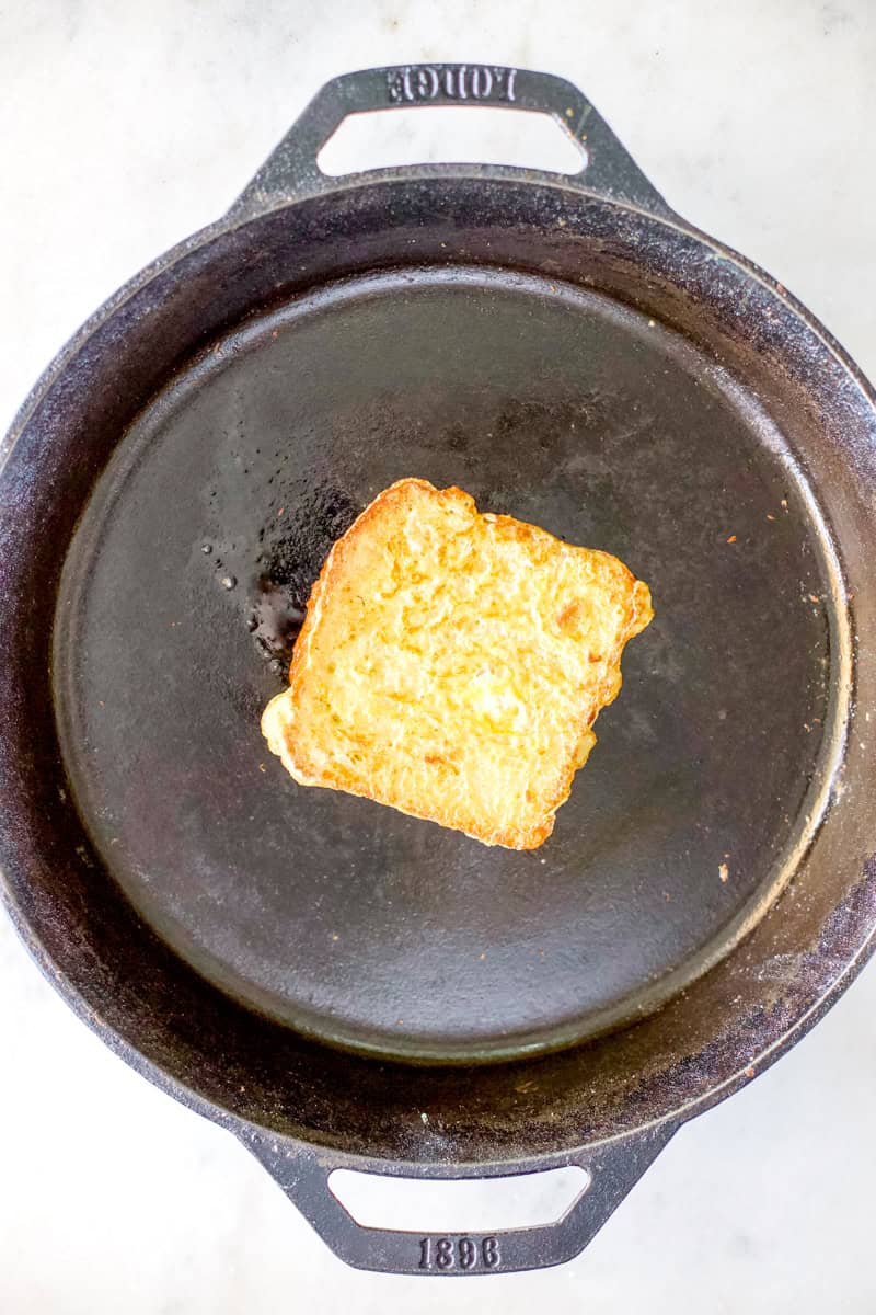 Place the bread in the skillet or on the griddle, and fry until both sides are golden brown; this should take about 2 minutes each side.