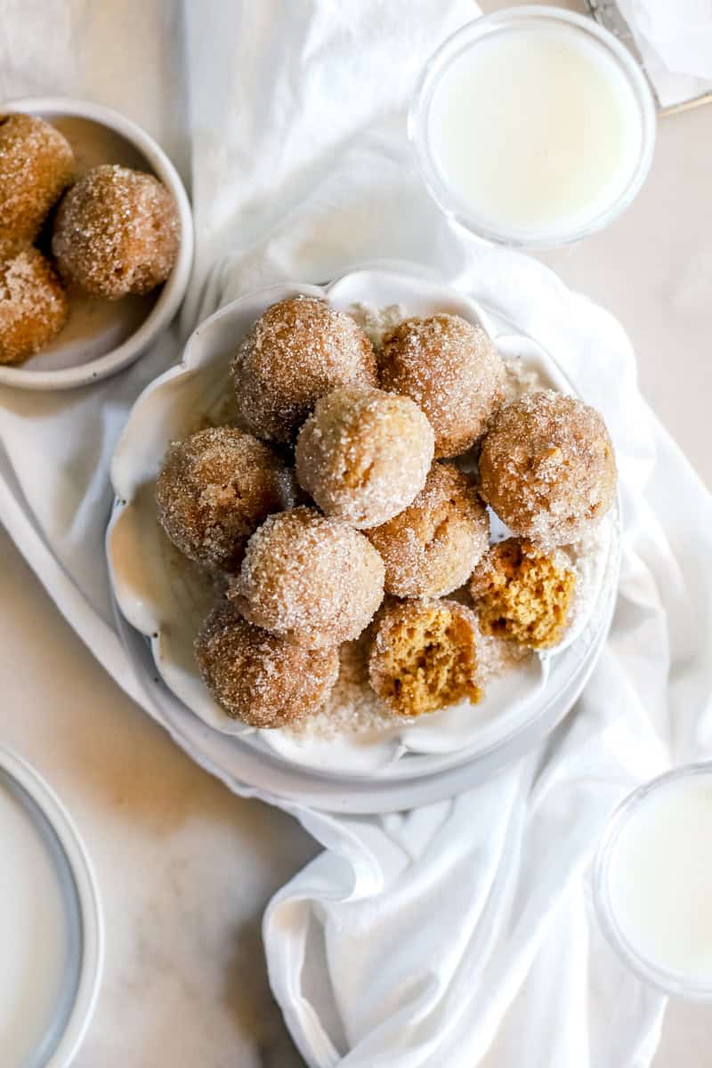 A plate of donut pumpkin spice donut holes.