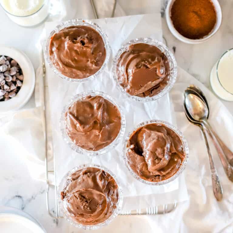 Bowls of creamy homemade chocolate pudding.