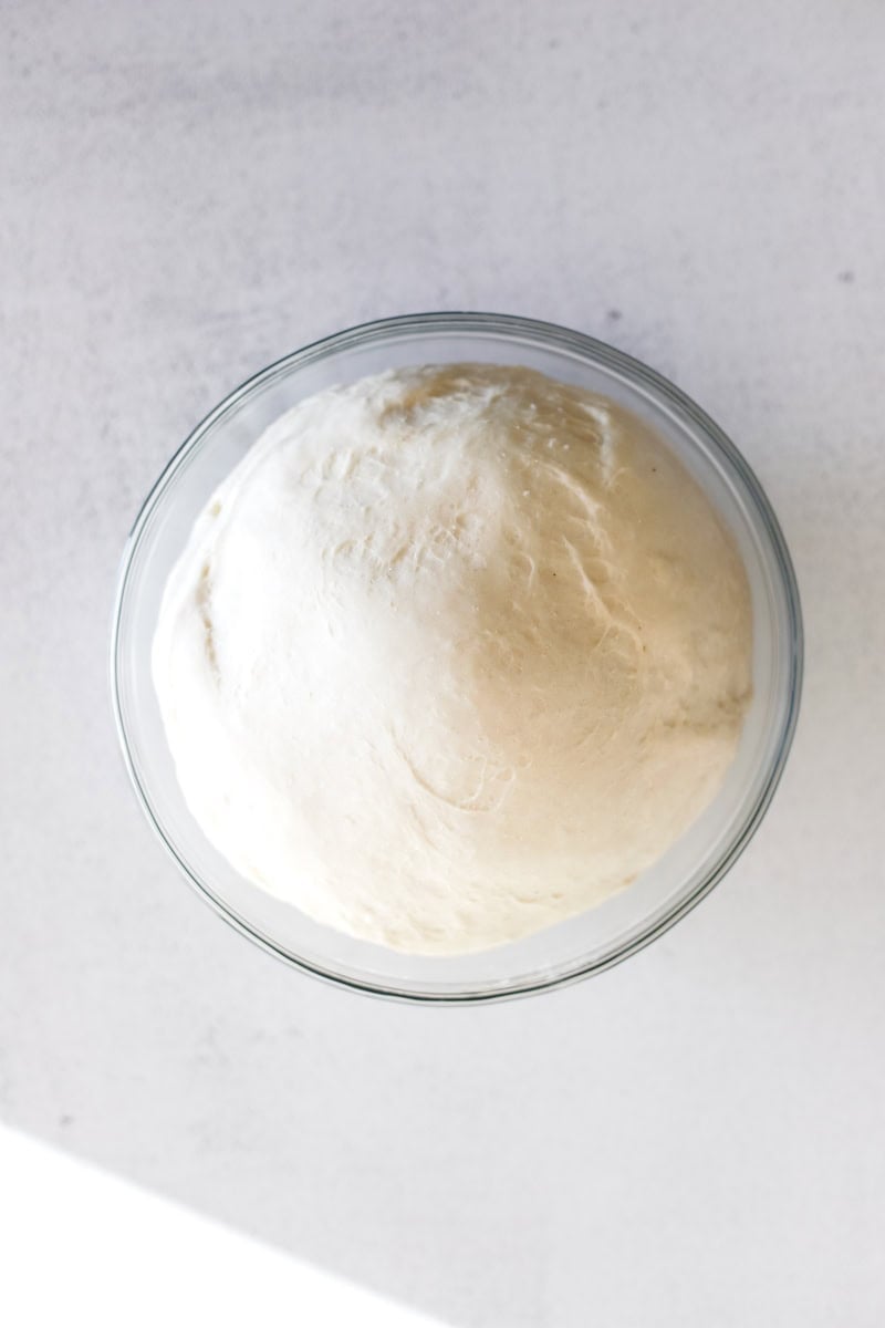 Step 3 of making sourdough bagels is proofing the dough.