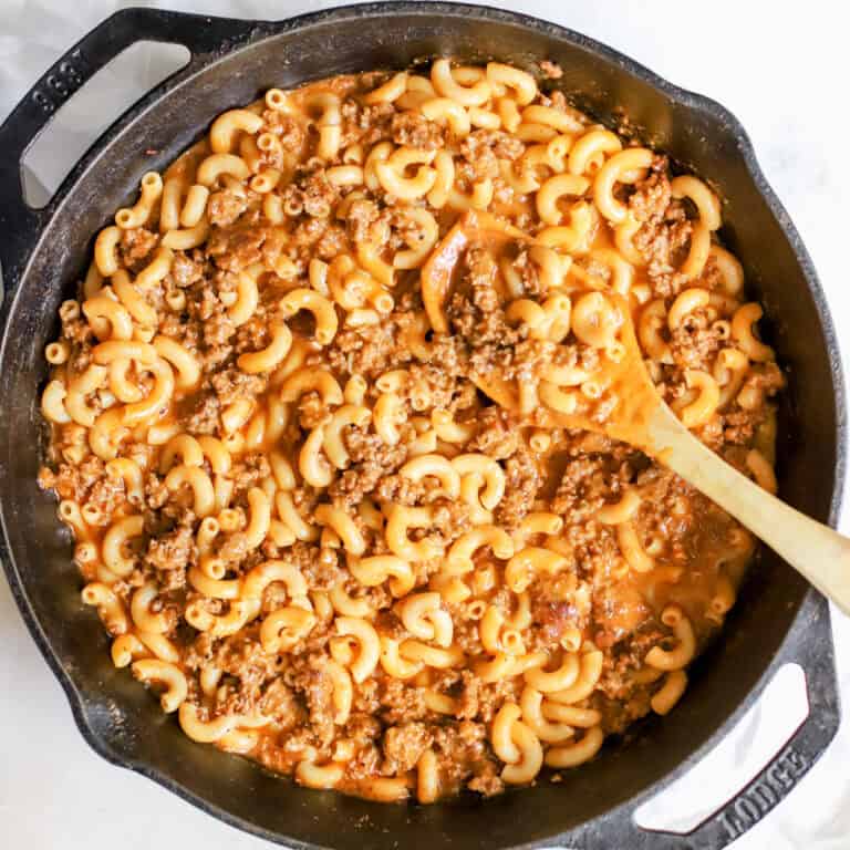 A cast iron skillet with venison hamburger helper.