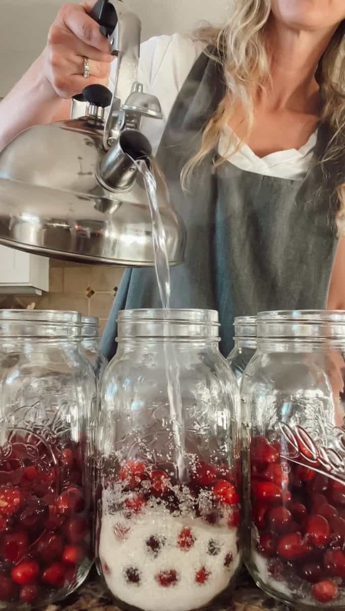 Top the jars off with boiling water.