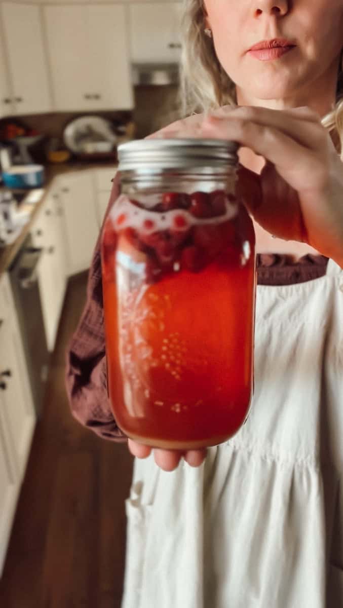 Once the jars have sealed, begin flipping them upside down to help agitate the juice.