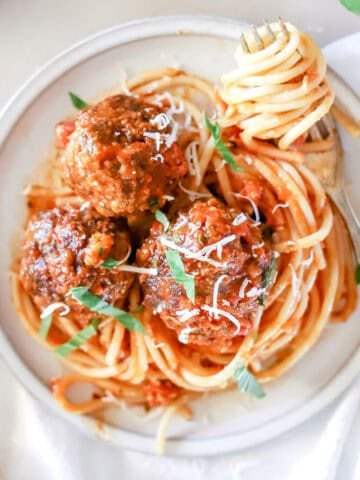 Easy venison meatballs with marinara sauce and spaghetti.