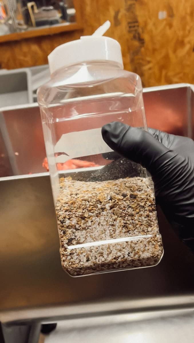 Step 2 mixing seasonings for smoked venison summer sausage.