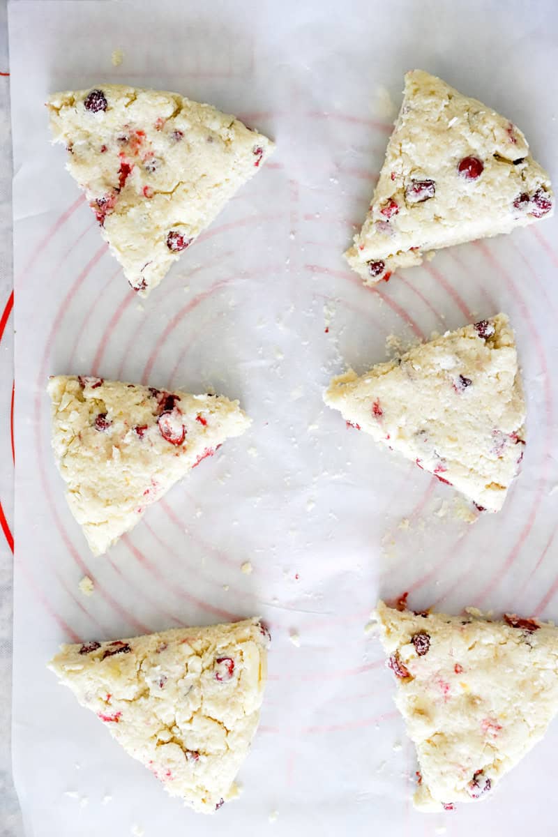 Step 6 of sourdough scones is Cut with a sharp knife or bench scraper into wedges. Separate the wedges to 2” apart. 
