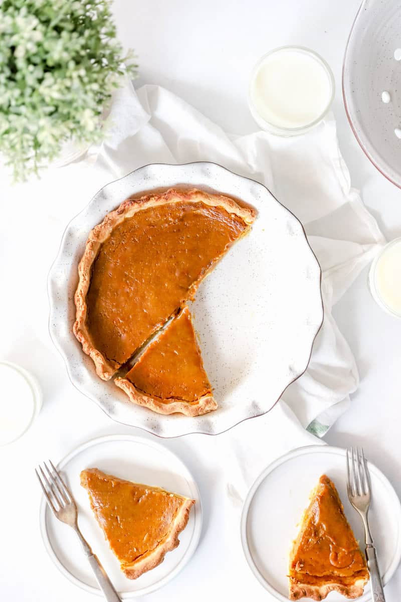 Top view of a homemade pumpkin pie in a classic butter crust.