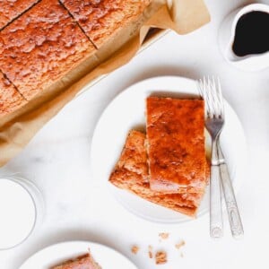 Sheet pan pancakes sliced on a plate.