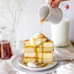 A pour shot of maple syrup on sourdough French toast.