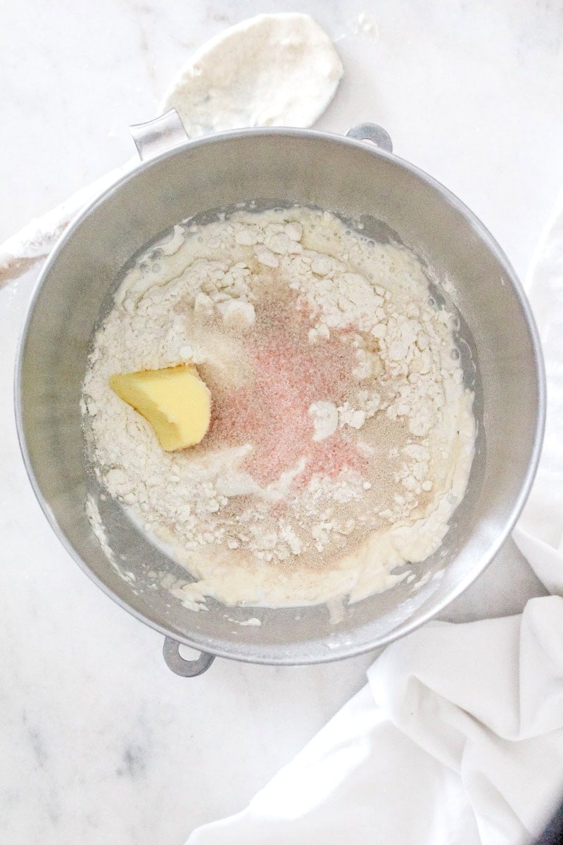 Step 2 In the bowl of a stand mixer fitted with the dough hook attachment, mix together all of the dough ingredients. 