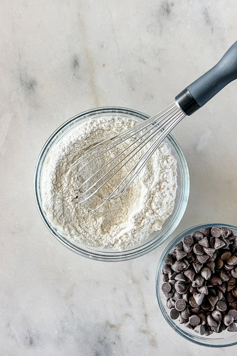 Step 4: In a separate bowl, whisk together the salt, baking powder, and flour.