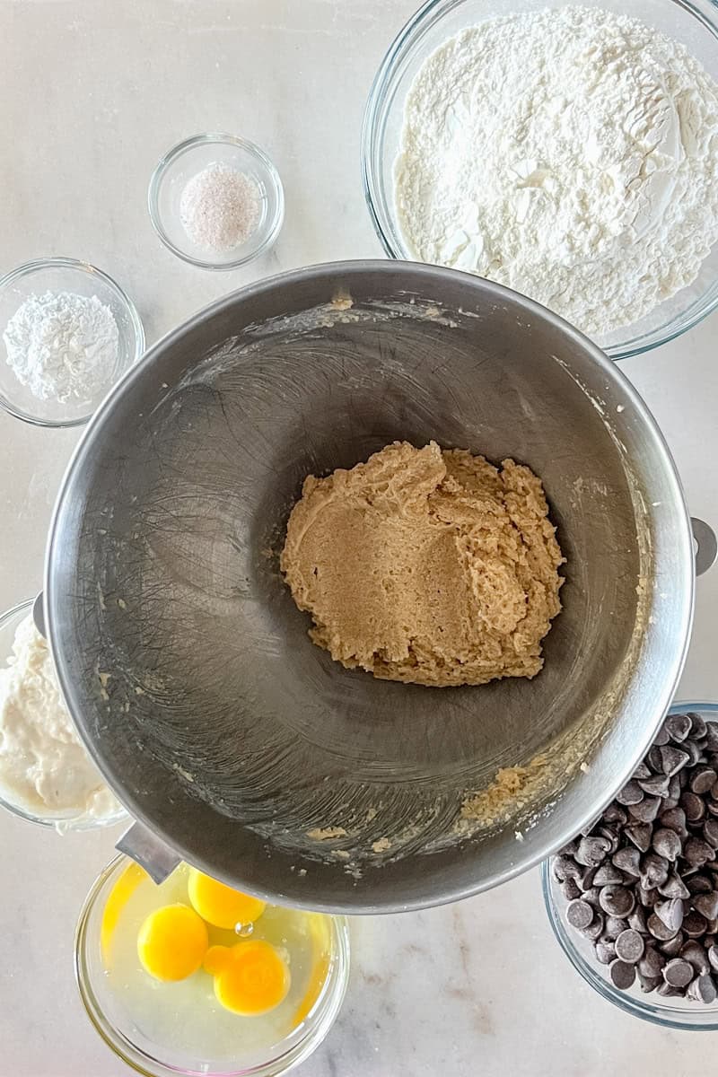 Step 2, In the bowl of a stand mixer, combine the room temperature butter and brown sugar, Beat on medium speed until light and fluffy, about 2 minutes.