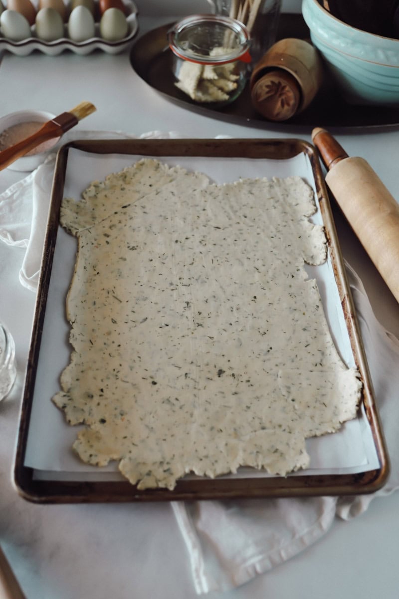 Step 2 Roll the dough with a rolling pin until it is about 1/16 of an inch thick.