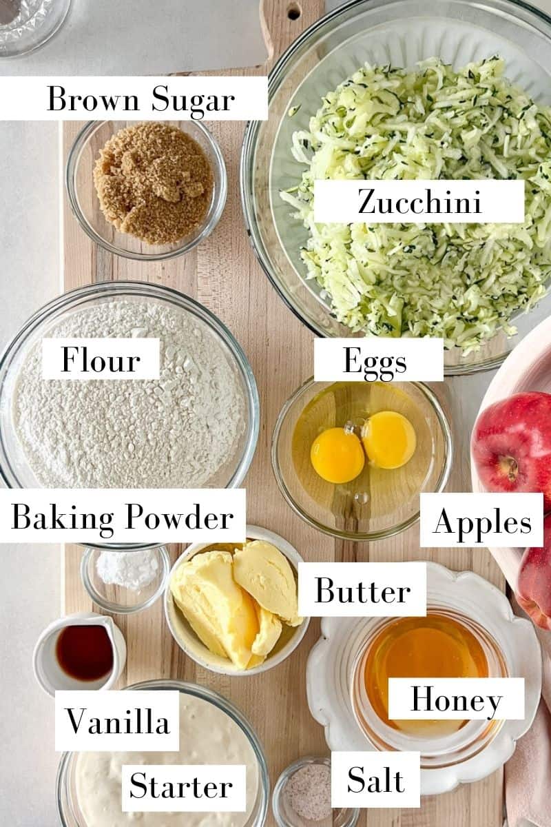 Ingredients for sourdough apple zucchini muffins in prep bowls.