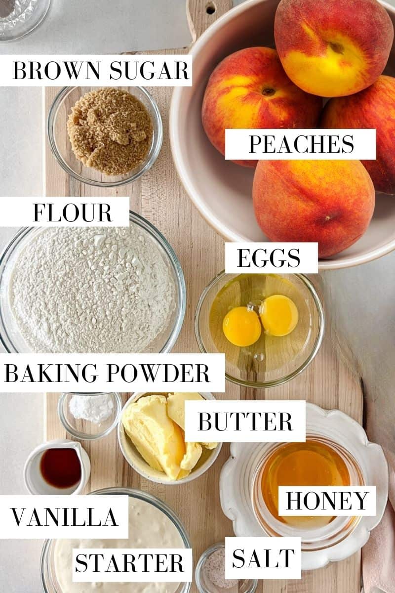 A top view of the ingredients for sourdough peach quick bread in prep bowls.