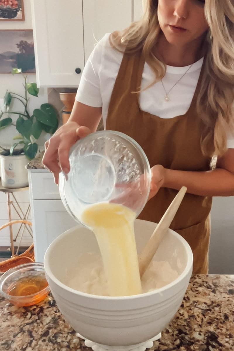 Step 3  Mix the ingredients together and then pour in the warm liquid mixture. 