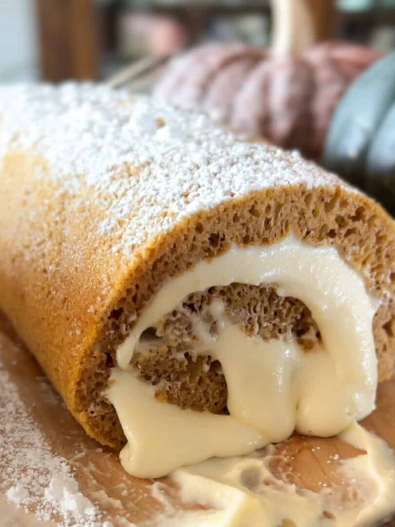A close up image of a sourdough pumpkin roll.