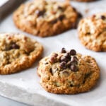 Detailed view of the best Cowboy Cookies with fresh-milled flour and thick, chewy, hearty cookies packed with oats, coconut, pecans, and chocolate.