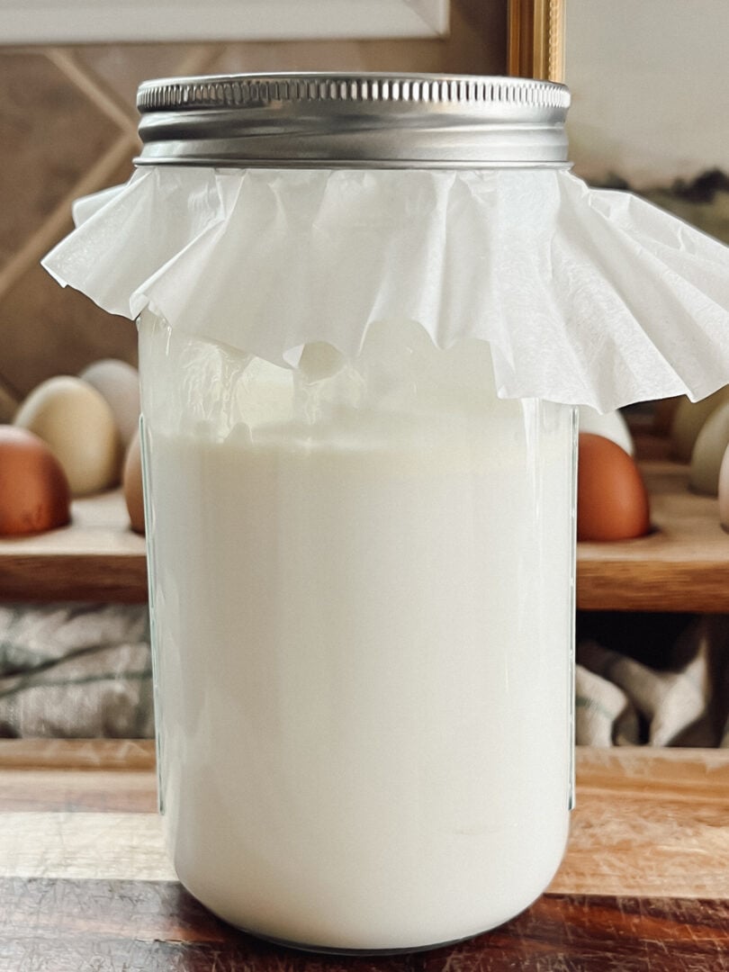 A clabber culture in a mason jar covered loosely with a coffee filter.